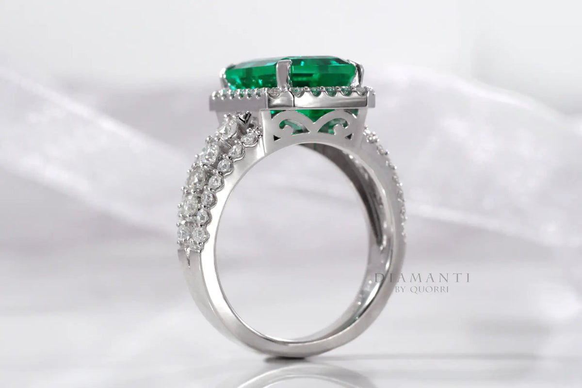 Canadian designer 14k white gold cultured lab grown Zambian or Colombian green emerald halo engagement ring Quorri Canada