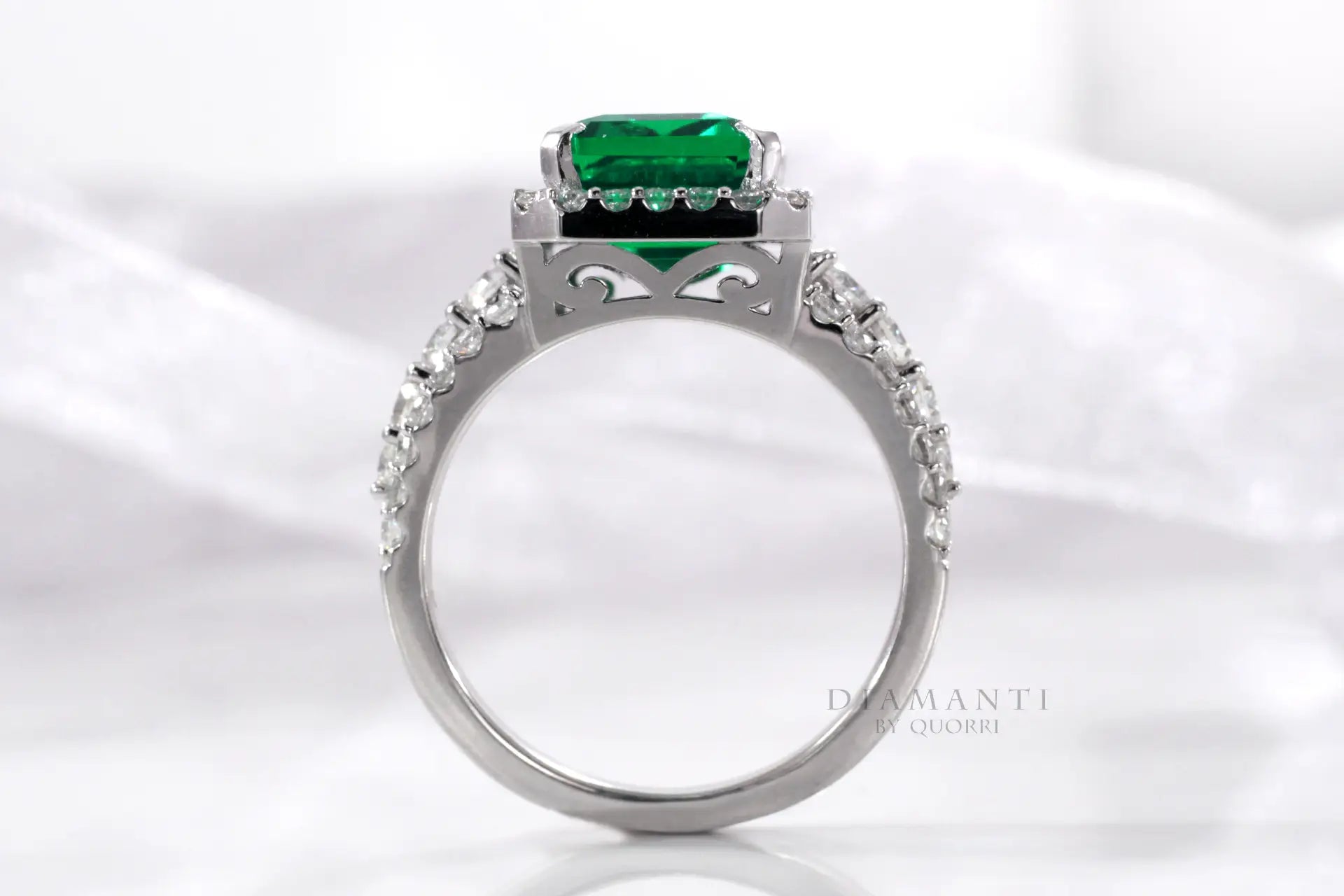 low cost designer white gold cultured lab grown Colombian Zambian emerald halo engagement ring Quorri Canada