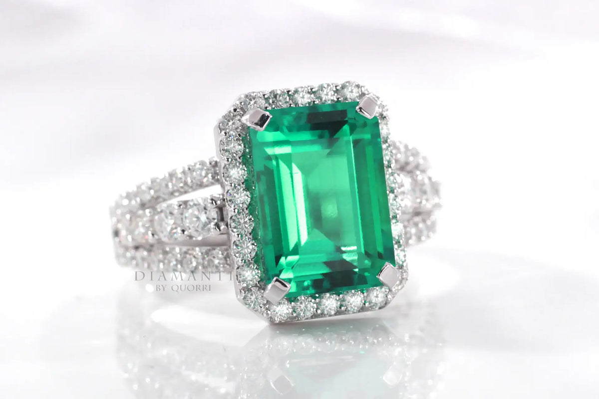 designer platinum 3 carat lab grown Colombian or Zambian emerald halo engagement ring Quorri Canada