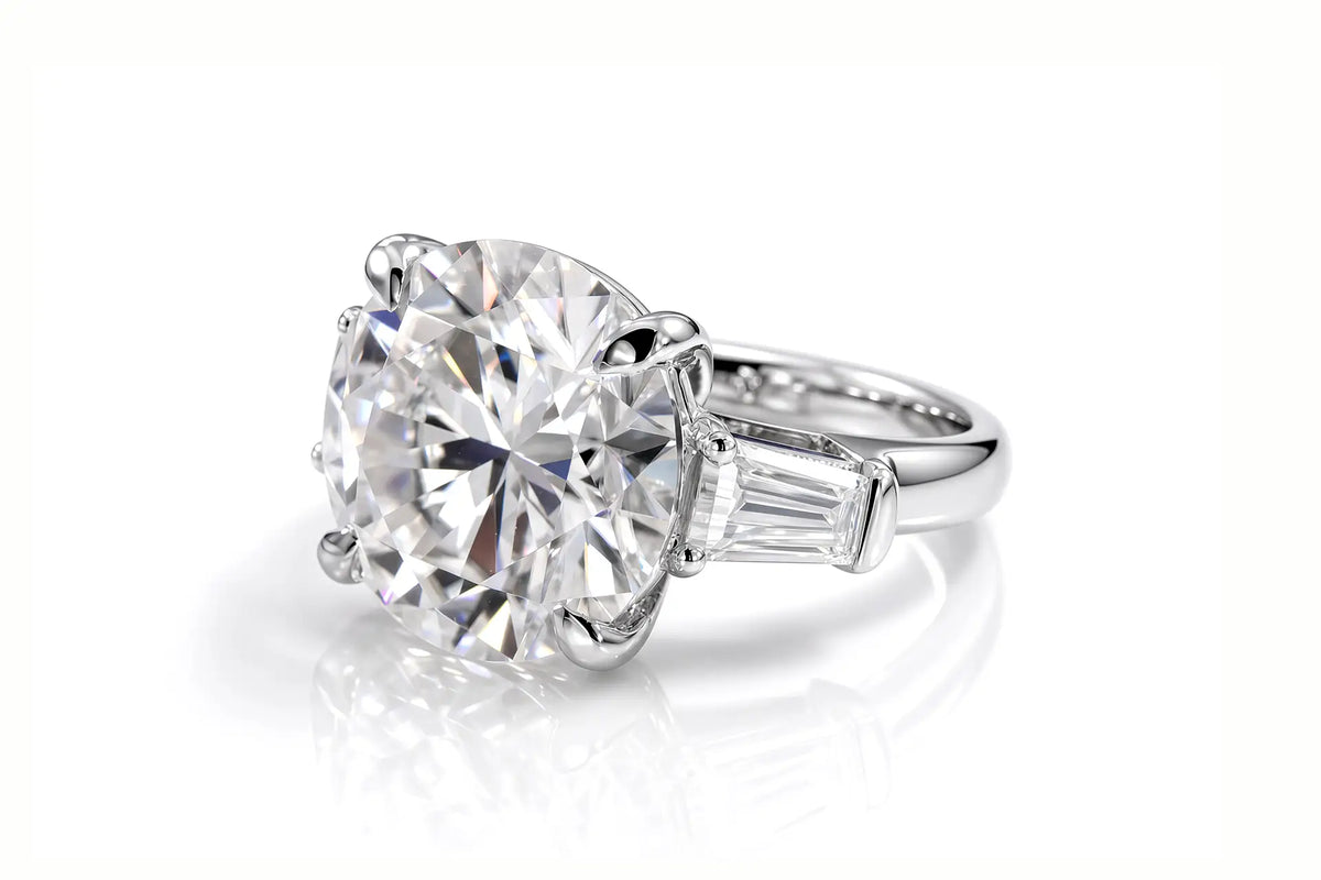 classic designer round and baguette three stone lab diamond engagement ring Quorri Canada