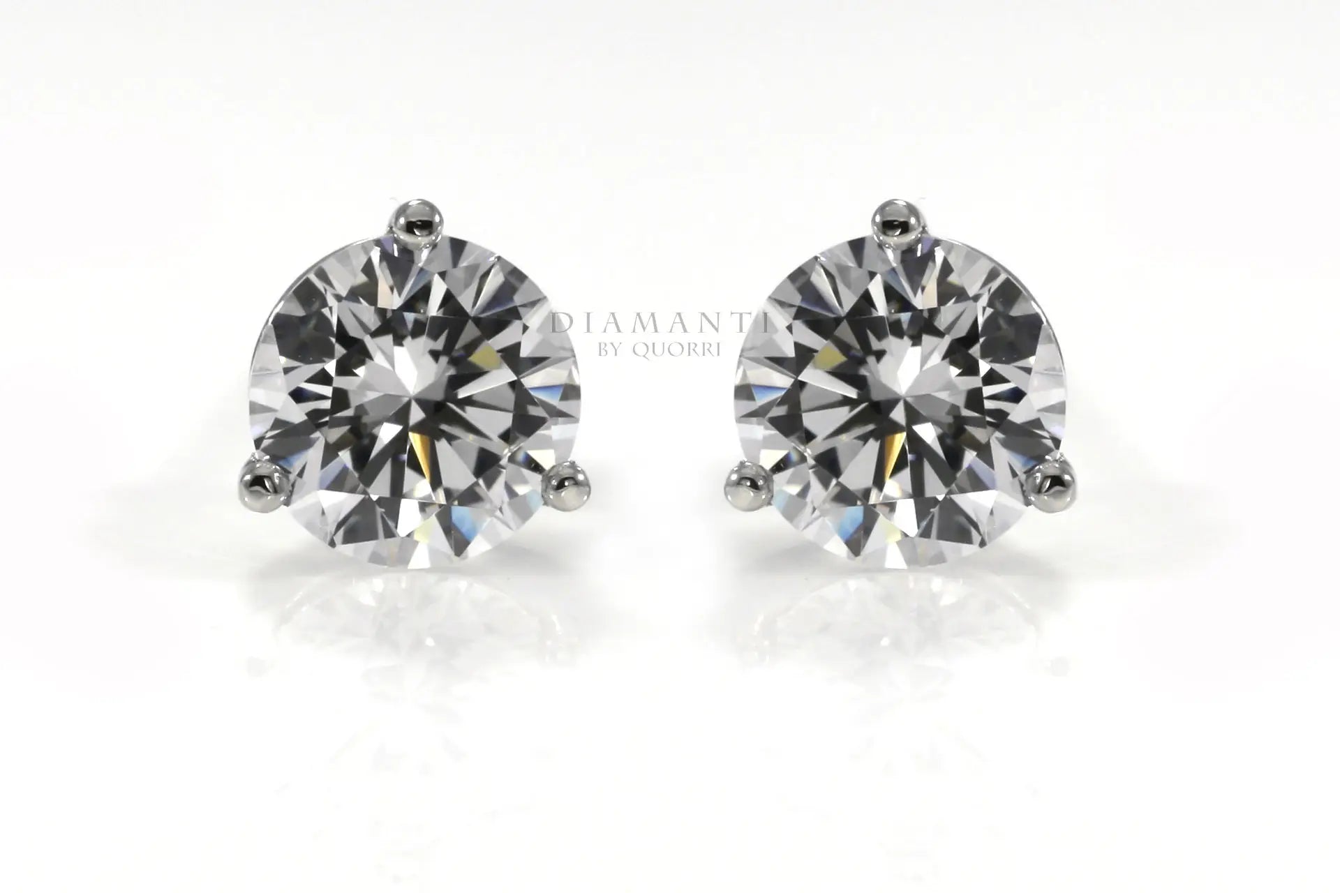 designer white gold three prong round martini lab diamond stud earrings Quorri