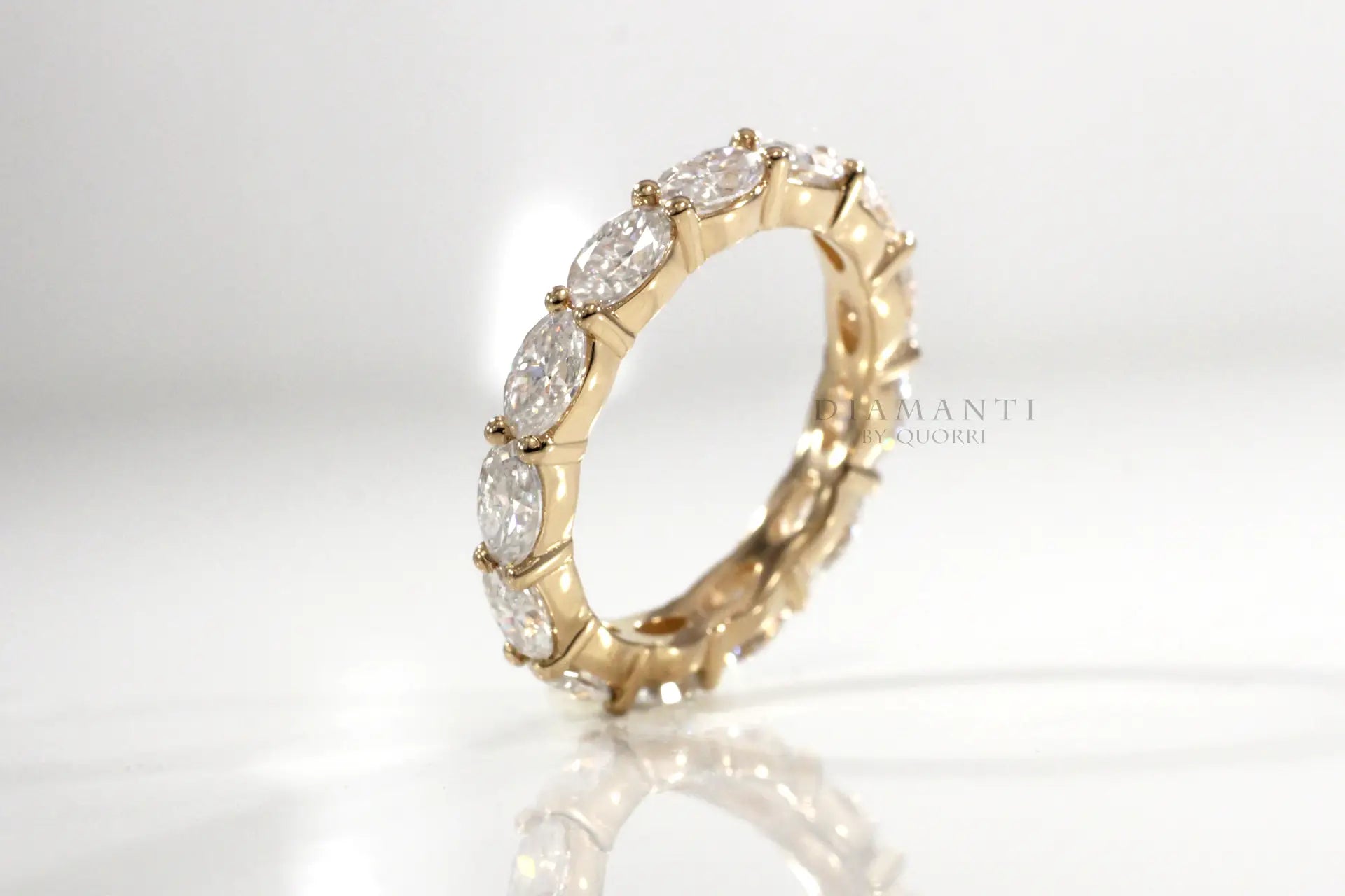 designer east west 18k yellow gold 2 carat oval lab diamond eternity anniversary and wedding rings Quorri Canada