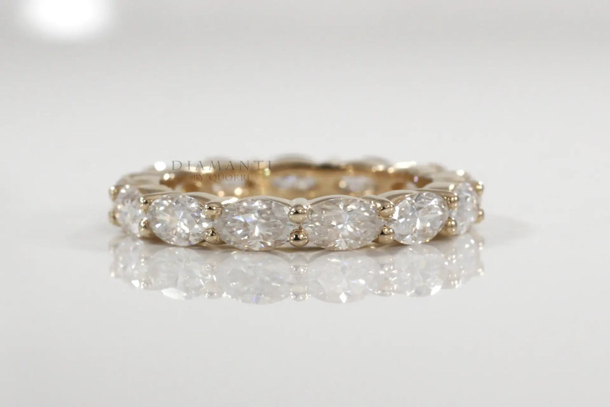 designer 18k yellow gold 4 carat east west oval lab diamond eternity anniversary and wedding rings Quorri Canada