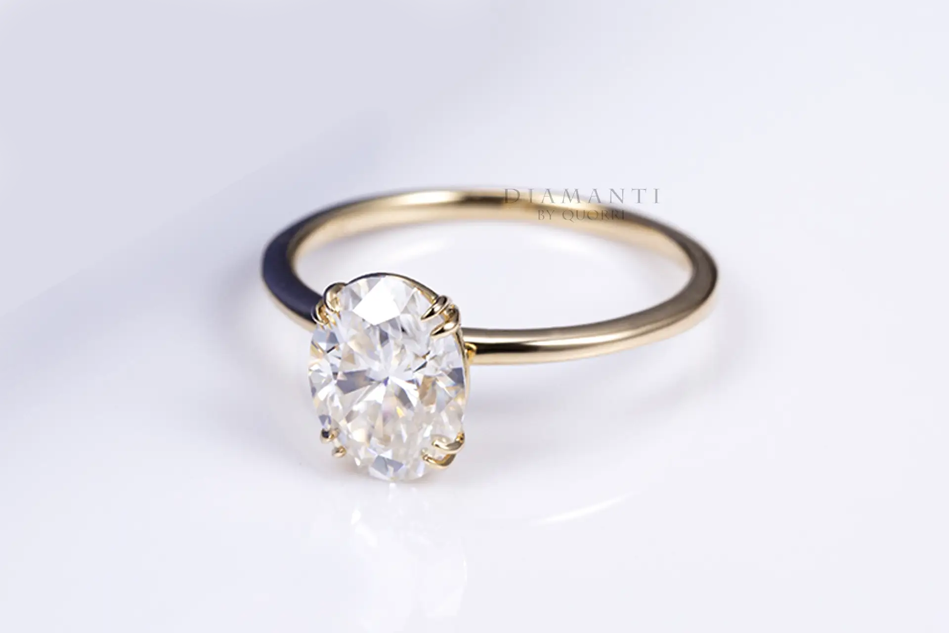 petite yellow gold dual claw oval lab diamond engagement ring Quorri 