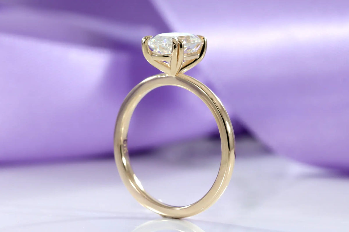 14k yellow gold dual claw two carat oval lab grown diamond solitaire engagement ring Quorri