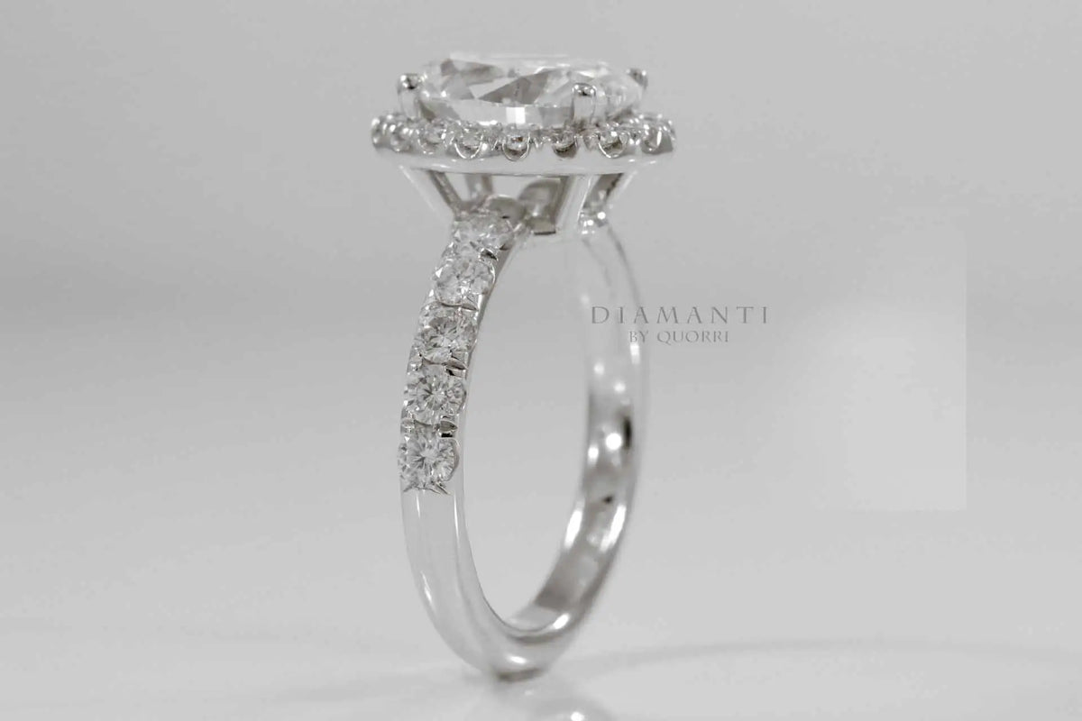 2 carat oval lab created diamond halo engagement ring in solid 18k white gold at Quorri Canada