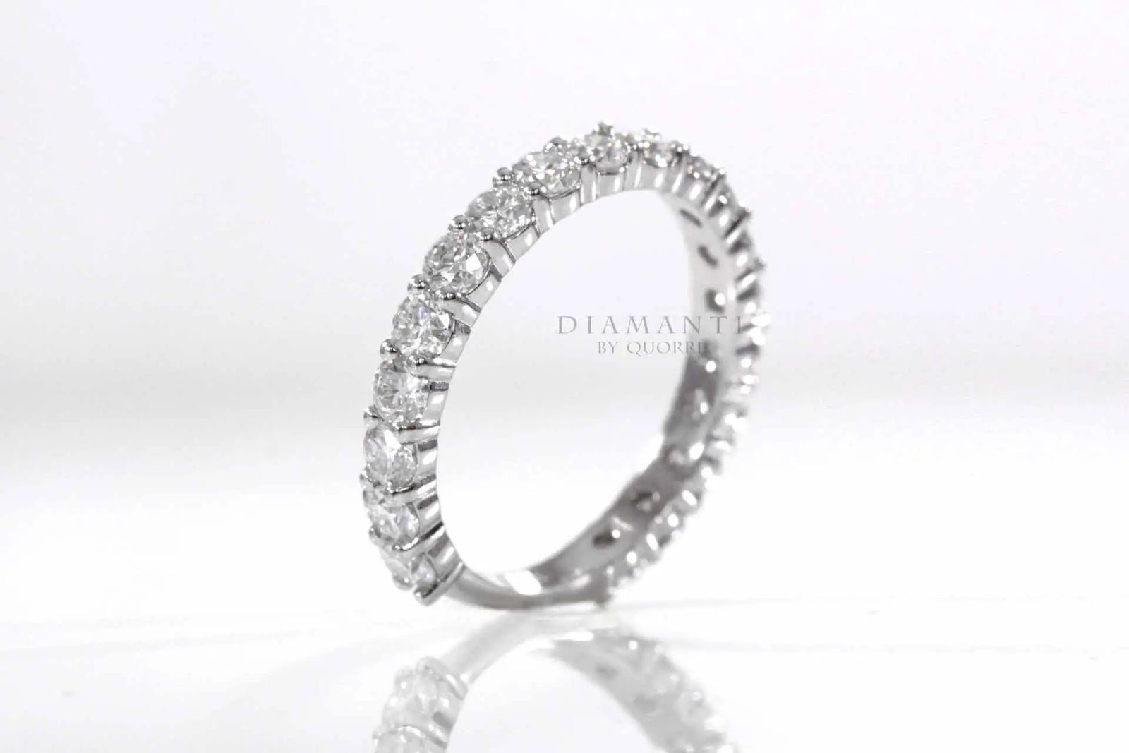 affordable designer platinum shared prong 2.5 carat round brilliant lab made diamond wedding band Quorri