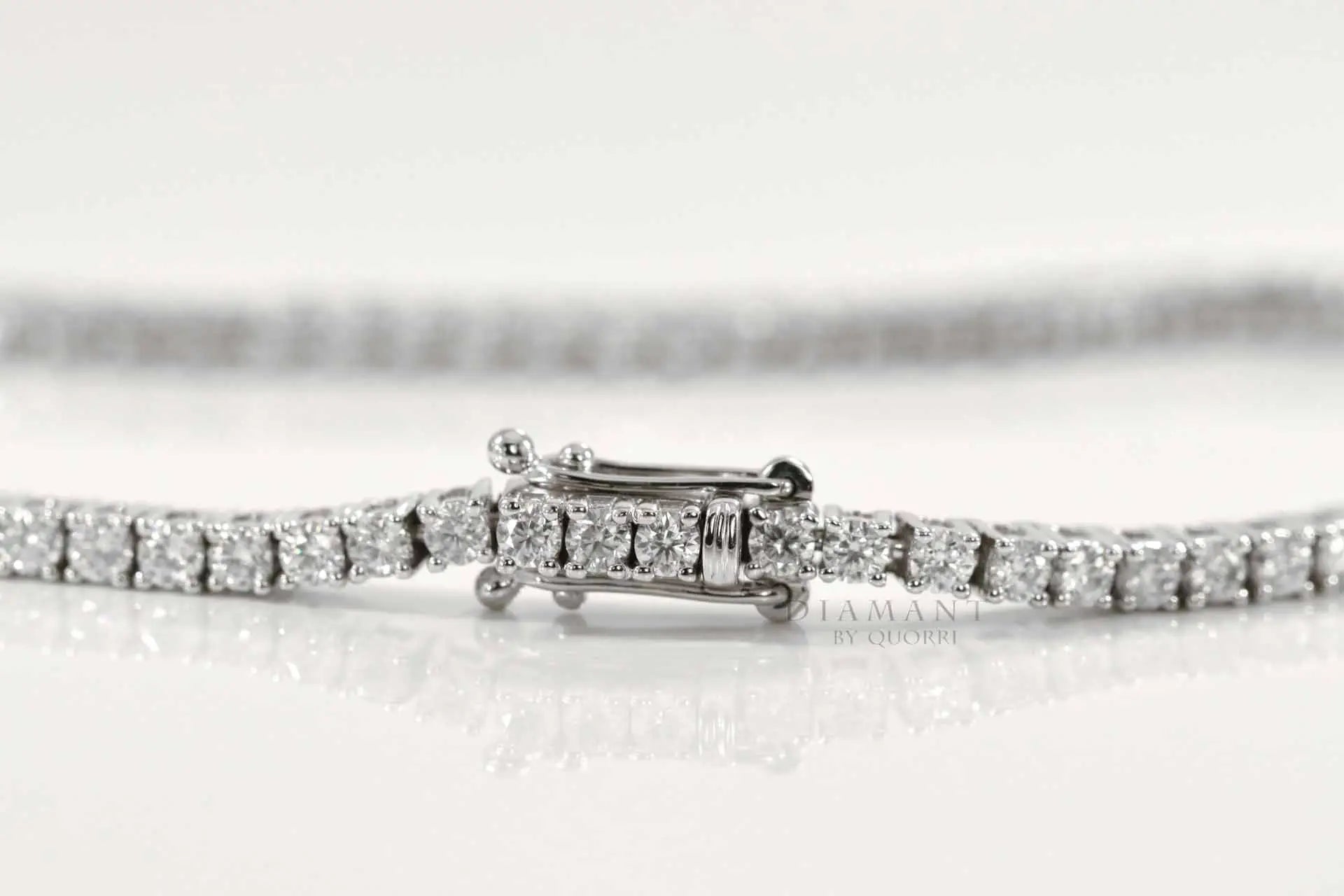 affordable white gold round lab diamond tennis bracelet Quorri