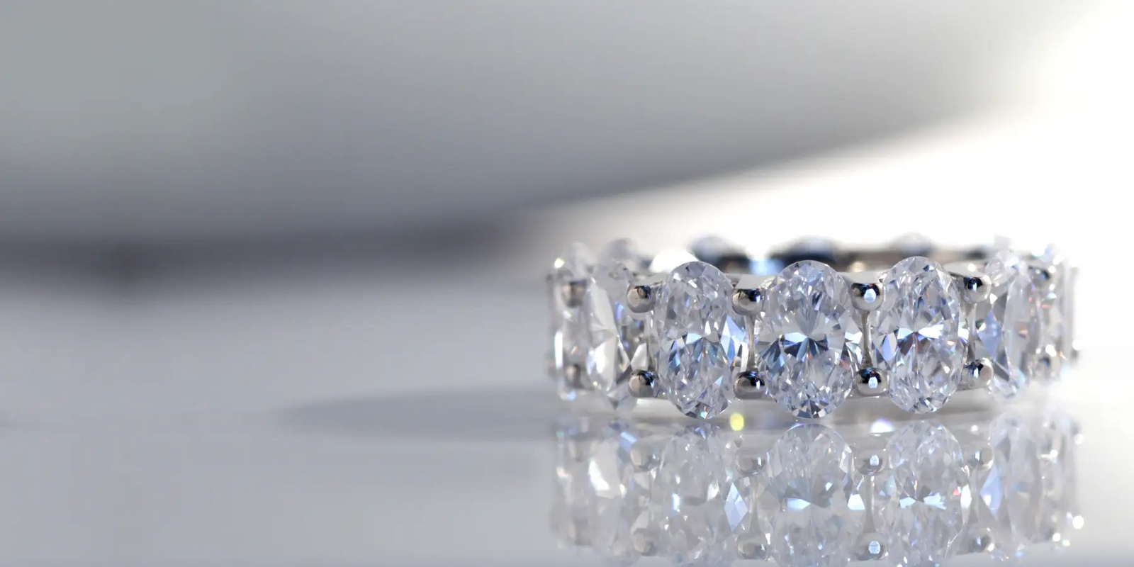 oval lab diamond eternity ring in solid gold and platinum