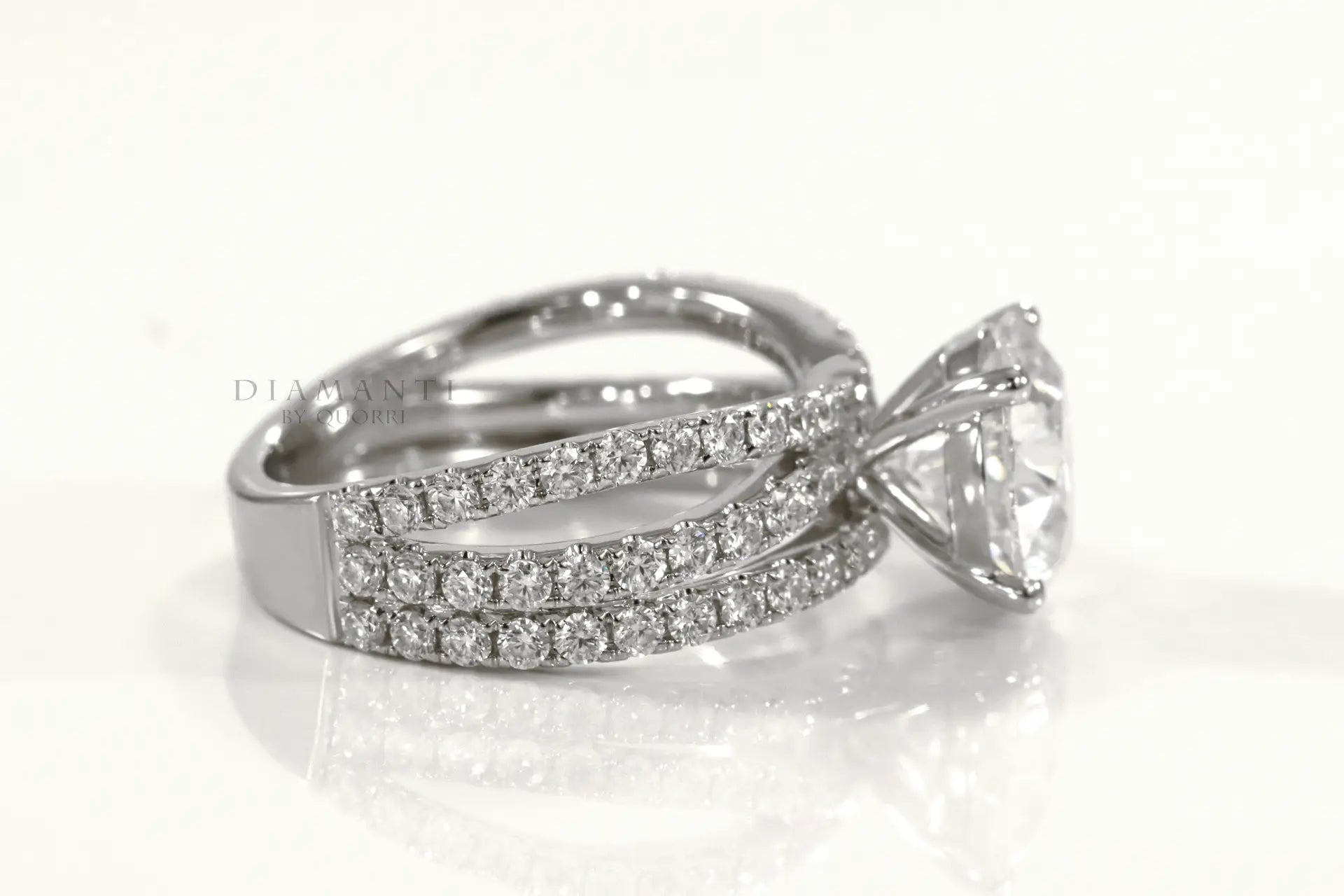 Criss cross diamond engagement ring discount