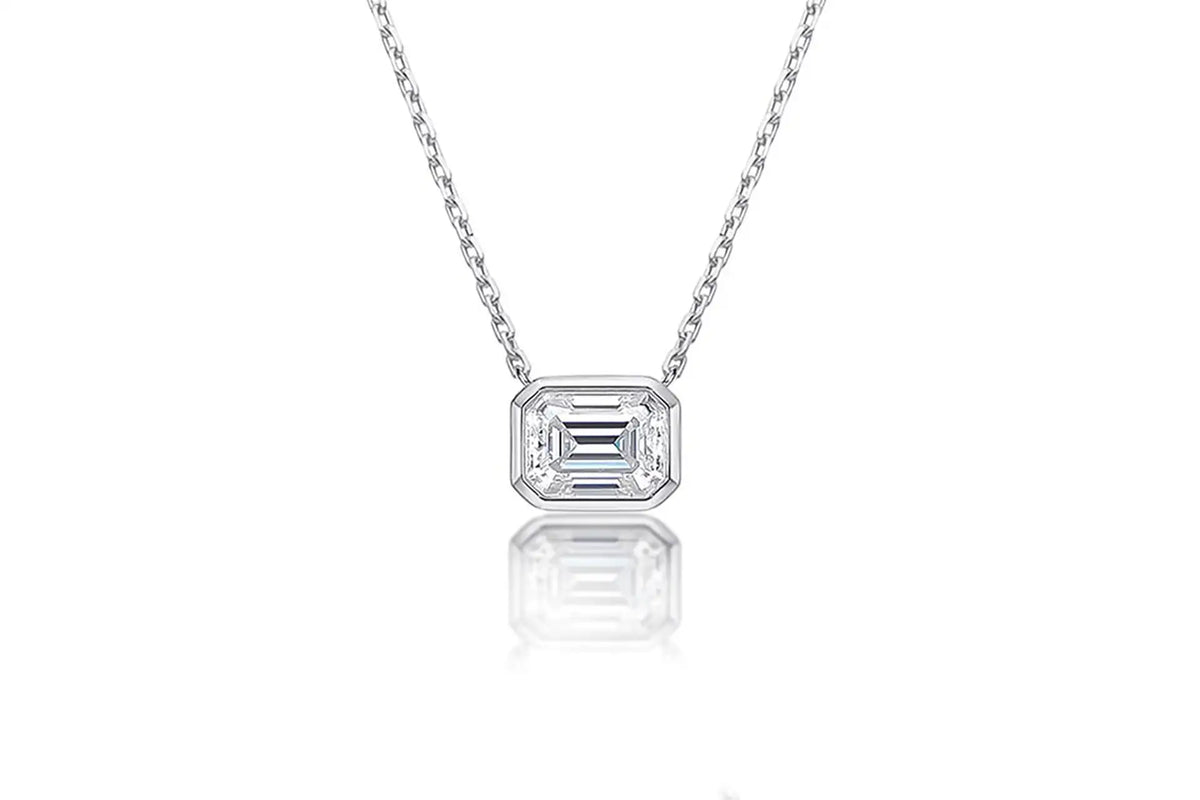 designer white gold bezel set  1.50 carat lab diamond emerald pendant and gold chain Quorri Canada