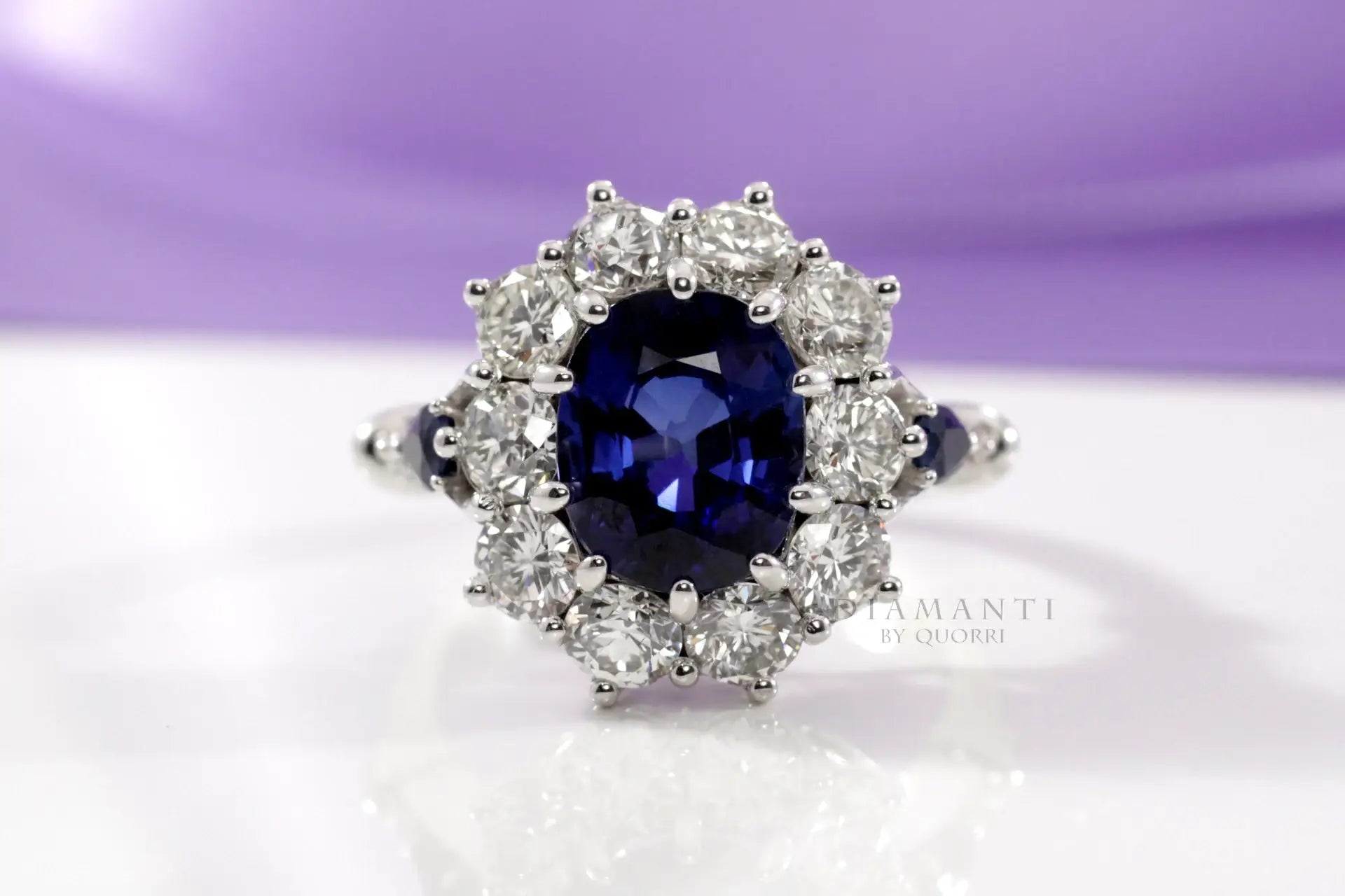 designer diamond halo with 4.5 carat oval blue lab grown sapphire engagement ring Quorri Canada