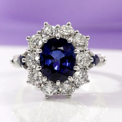 oval halo lab grown blue sapphire and diamond engagement ring