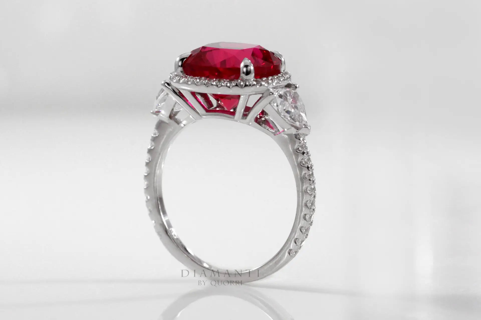 claw prong halo three stone 4ct red ruby white gold lab diamond engagement ring Quorri