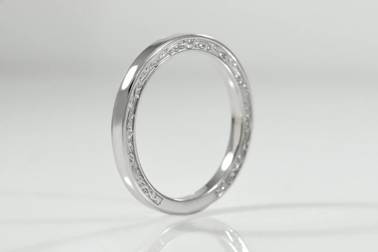 18k white gold rose and vine motif hand engraved designer wedding band Quorri