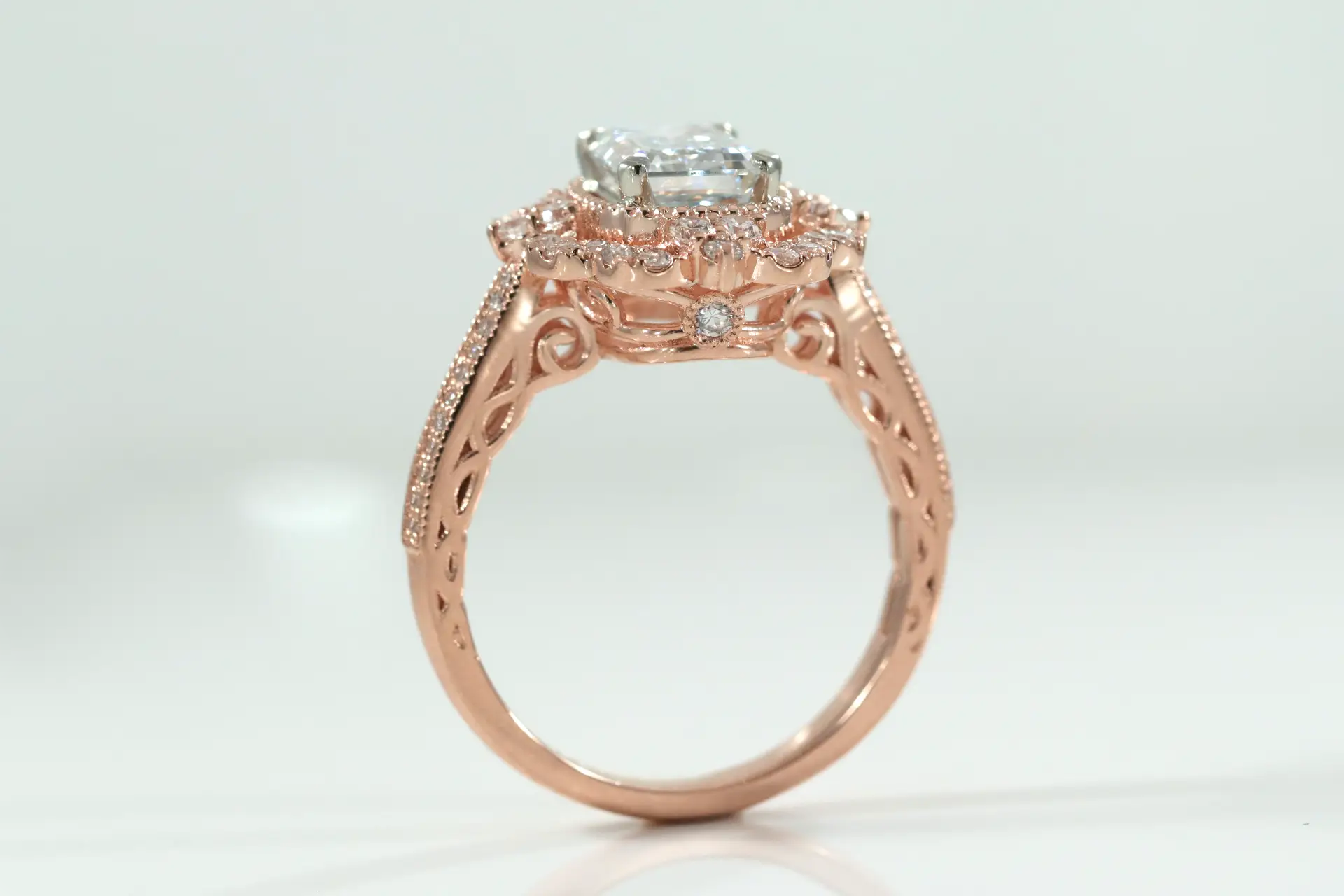 rose gold designer vintage halo 2.5 carat emerald cut lab grown diamond engagement ring Quorri