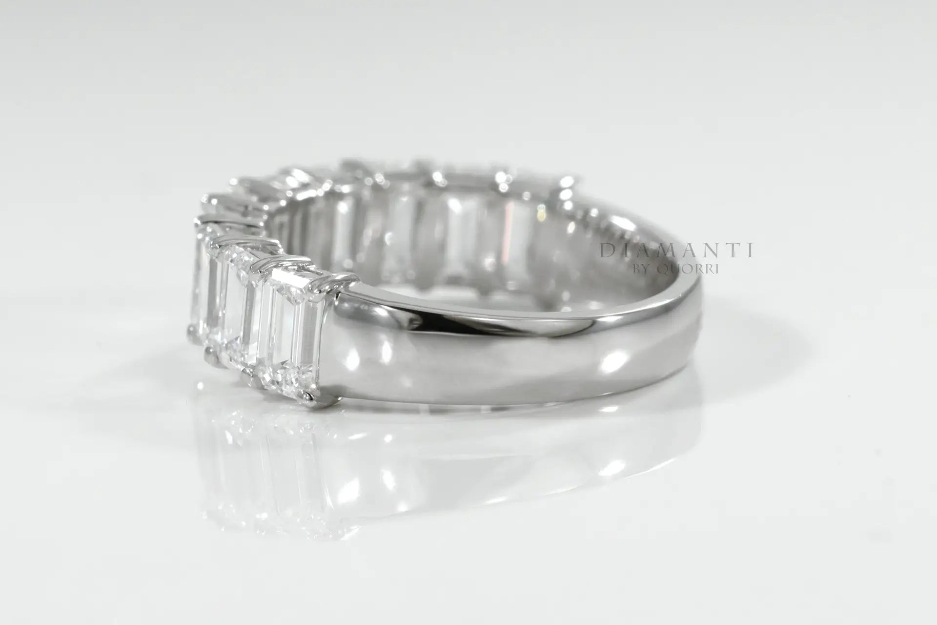 affordable designer platinum emerald cut lab made diamond wedding and anniversary ring at Quorri