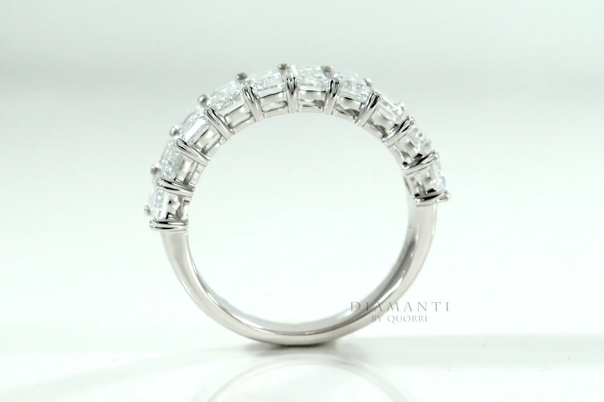 shared prong designer white gold 3 carat emerald cut diamond wedding and anniversary ring at Quorri
