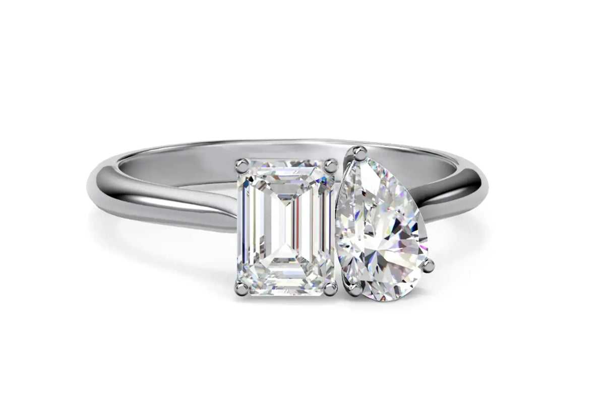 designer Toi et Moi 1 carat emerald and 1 carat pear diamond and gemstone ring Quorri