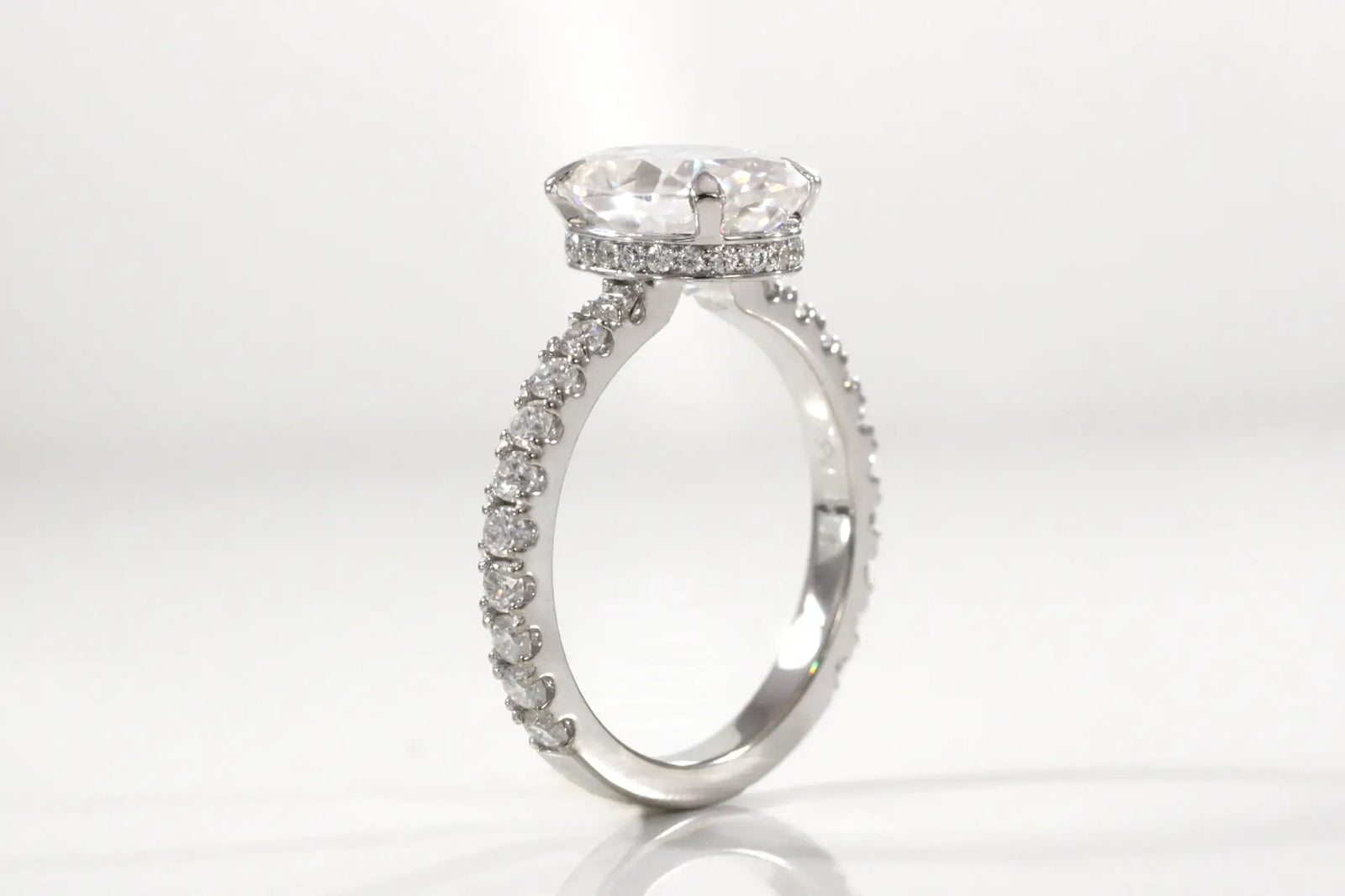 18k white gold 3 carat claw prong hidden-halo oval lab grown diamond accented engagement ring Quorri