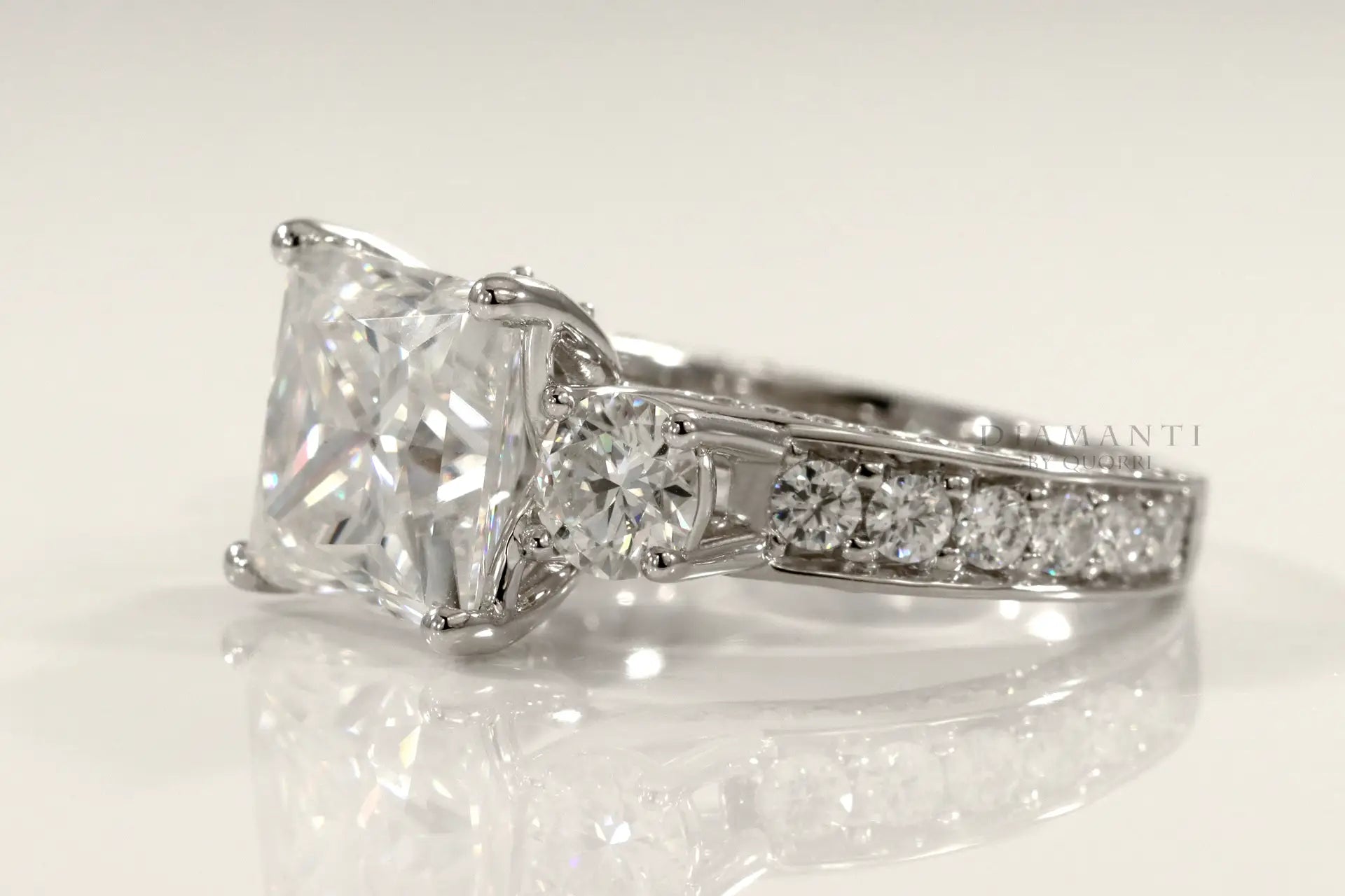 vera wang inspired 18k white gold princess and round three stone lab made diamond engagement ring Quorri
