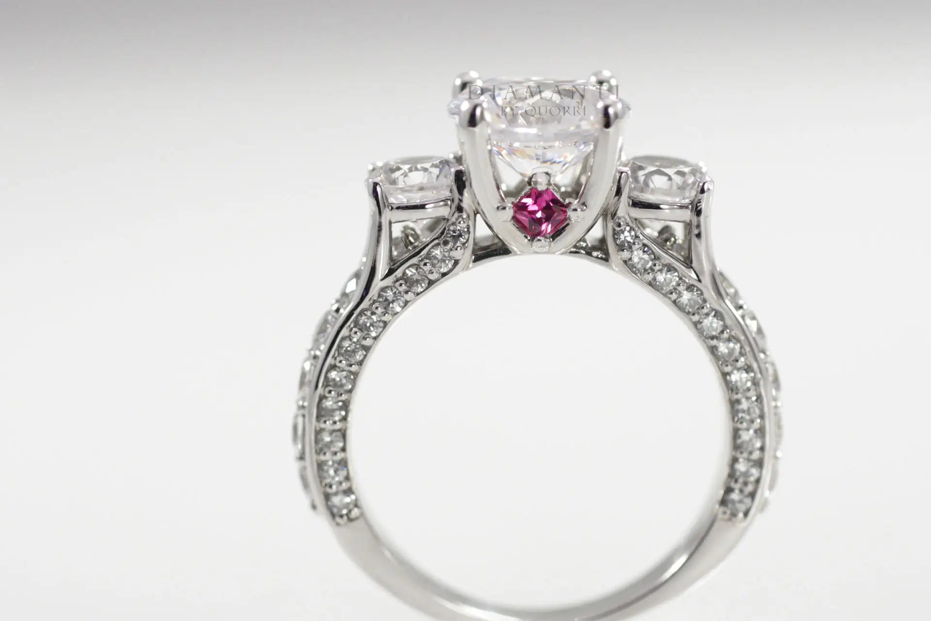 antique inspired ruby accented 3 stone 1.5ct round lab diamond engagement ring