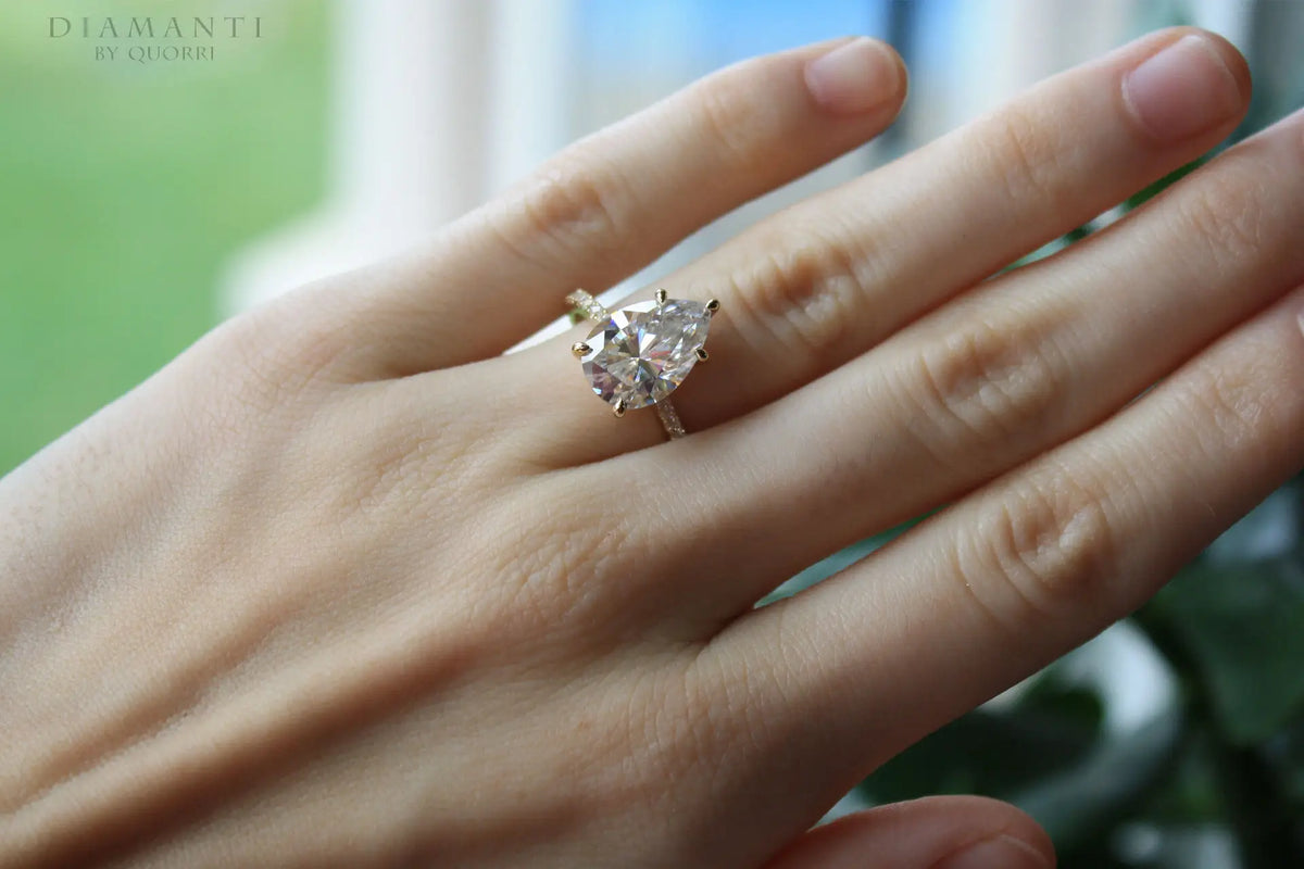designer 5 prong 14k yellow gold 3.5 carat lab grown diamond pear accented engagement ring Quorri