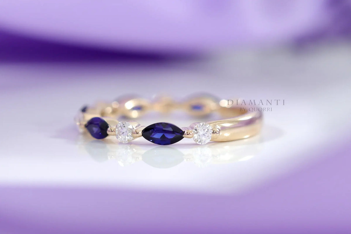 designer 18k yellow gold alternating white lab diamond and blue sapphire wedding band Quorri