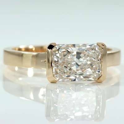 Zahra 3 carat east west bezel lab diamond radiant cut engagement ring yellow gold - Quorri