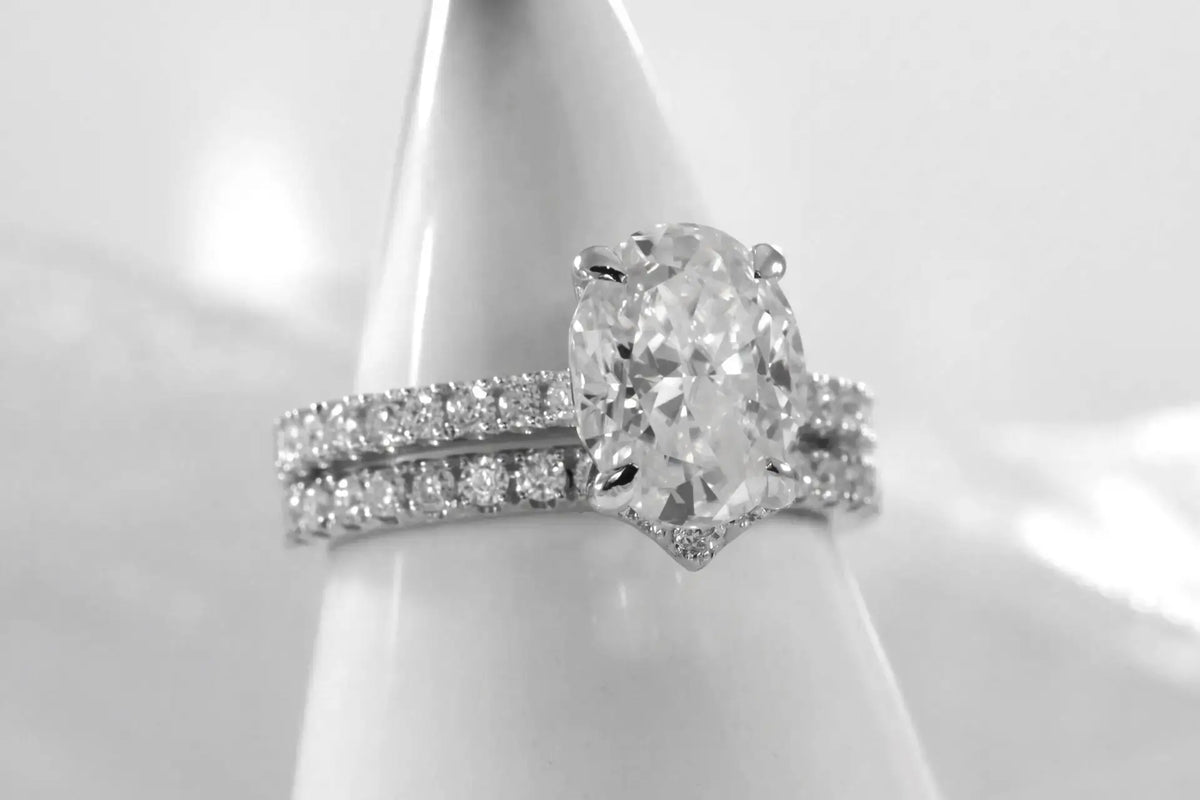 affordable crescent 14k white gold round brilliant lab diamond wedding band and 1.5ct oval engagement ring Quorri