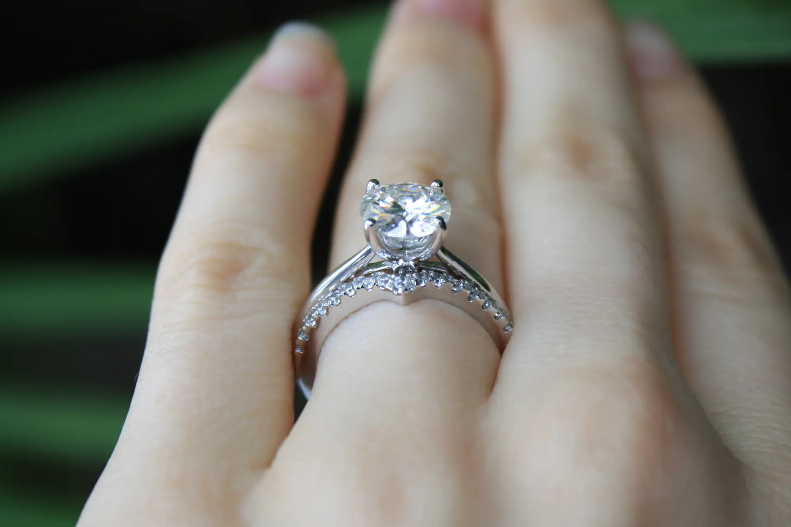 affordable designer crescent 14k white gold round brilliant lab diamond wedding band and 1 carat round solitaire engagement ring set Quorri