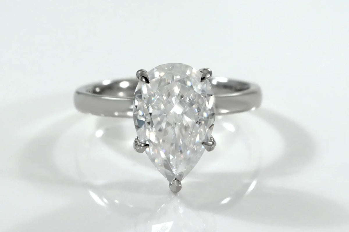 platinum 4 carat pear lab diamond solitaire engagement ring Quorri Canada