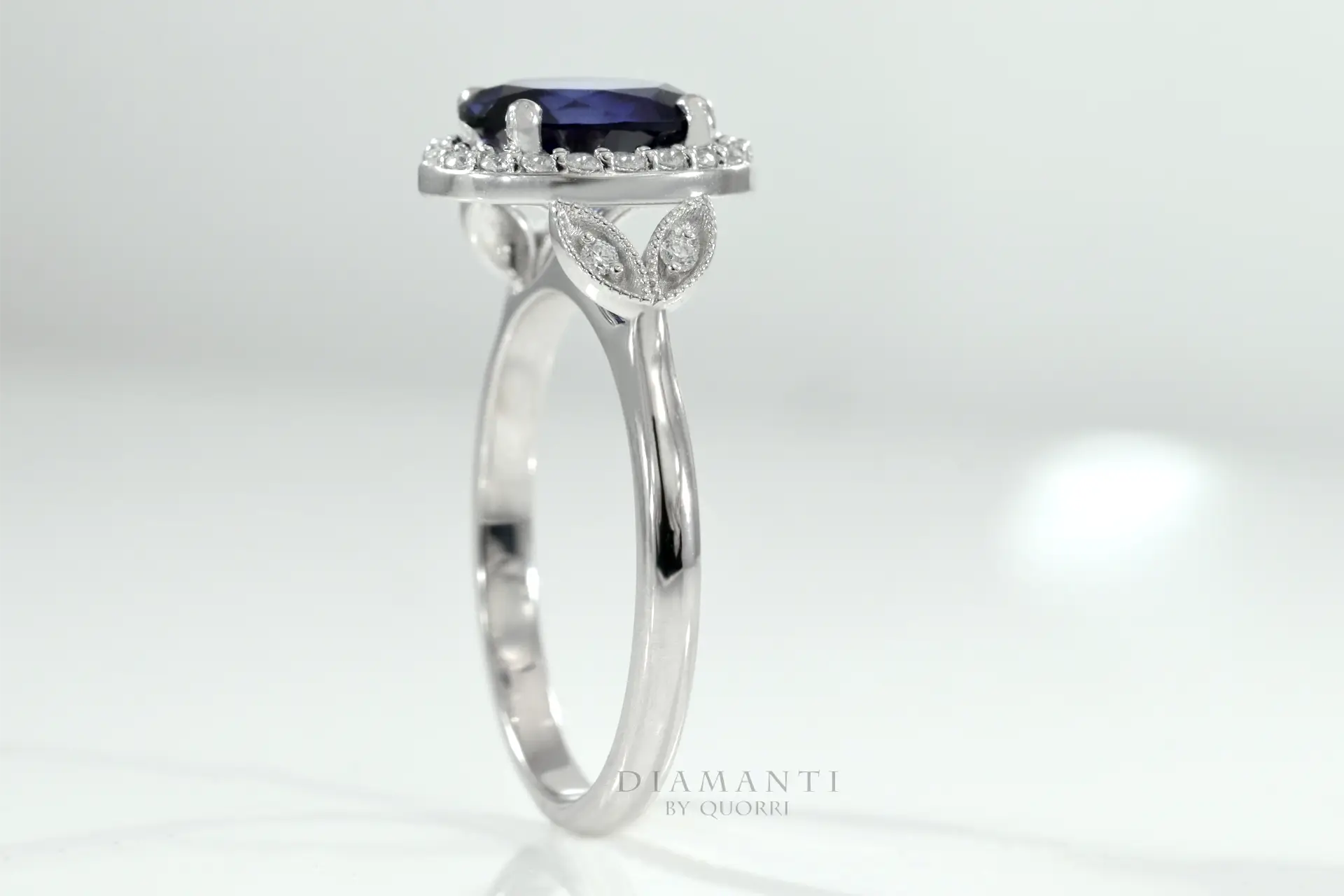 18k white gold lab grown 4 carat blue sapphire halo engagement ring Quorri Canada