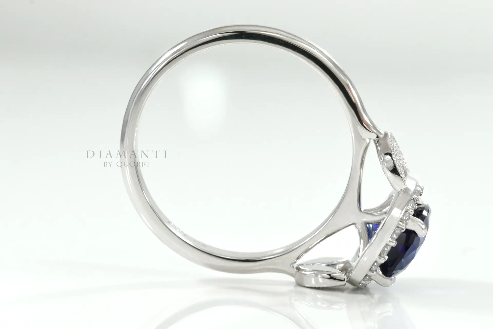 18k white gold lab grown 4 carat blue sapphire halo engagement ring with mill-grain Quorri Canada