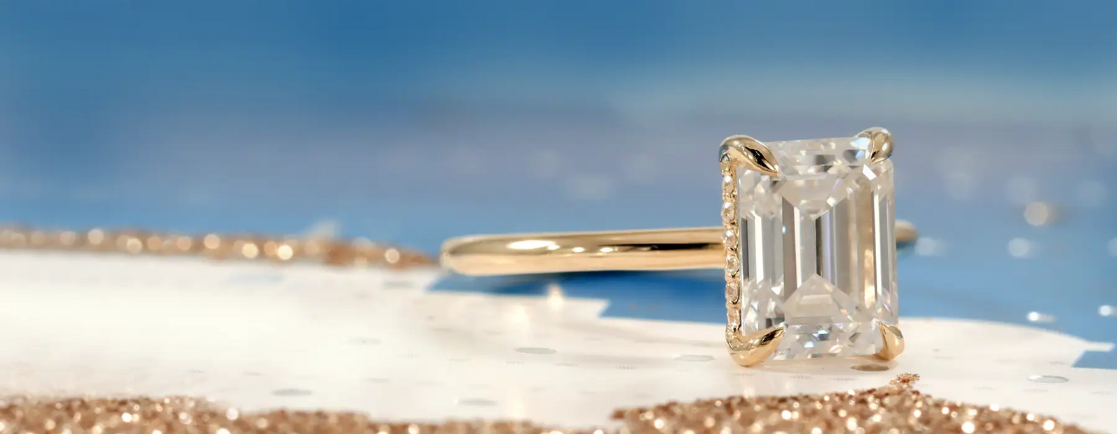 buy affordable 18k yellow gold under halo claw prong emerald cut lab diamond engagement ring