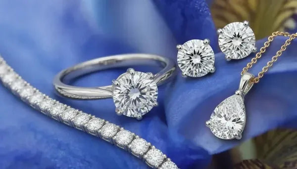 lab diamond solitaire ring, stud earrings, tennis bracelet and solitaire pendant at Quorri