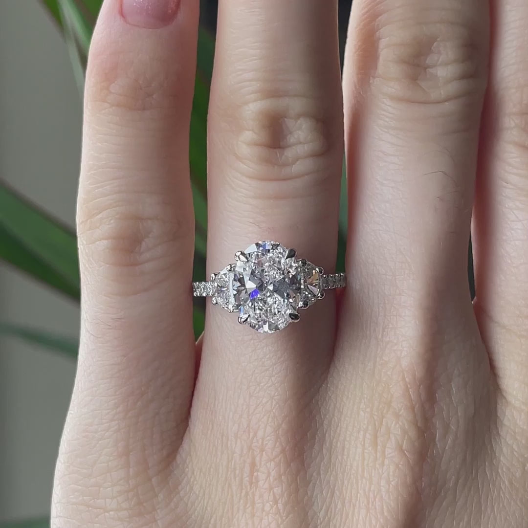 claw prong 18k white gold designer 3 carat oval and moon cut lab made diamond engagement ring Quorri Canada