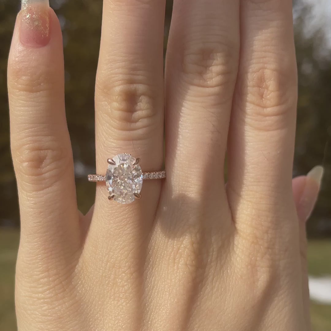 designer claw prong 18k rose gold under halo 4 carat oval lab grown diamond engagement ring Quorri Canada
