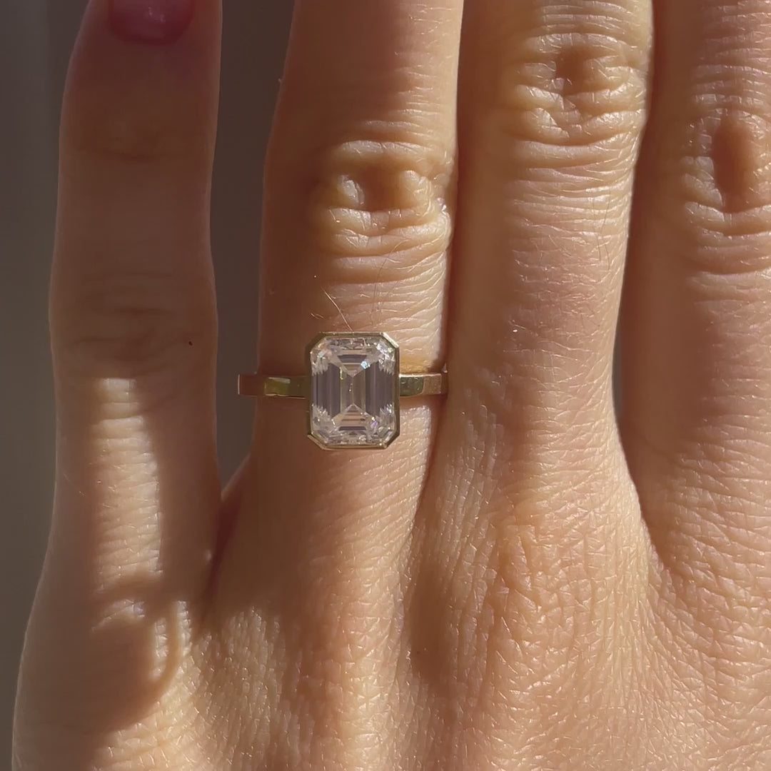 18k yellow gold full bezel 3 carat emerald cut lab grown diamond engagement ring Quorri Canada