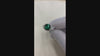 18k white gold cushion cut designer three stone green emerald and trillion halo diamond engagement ring Quorri Canada