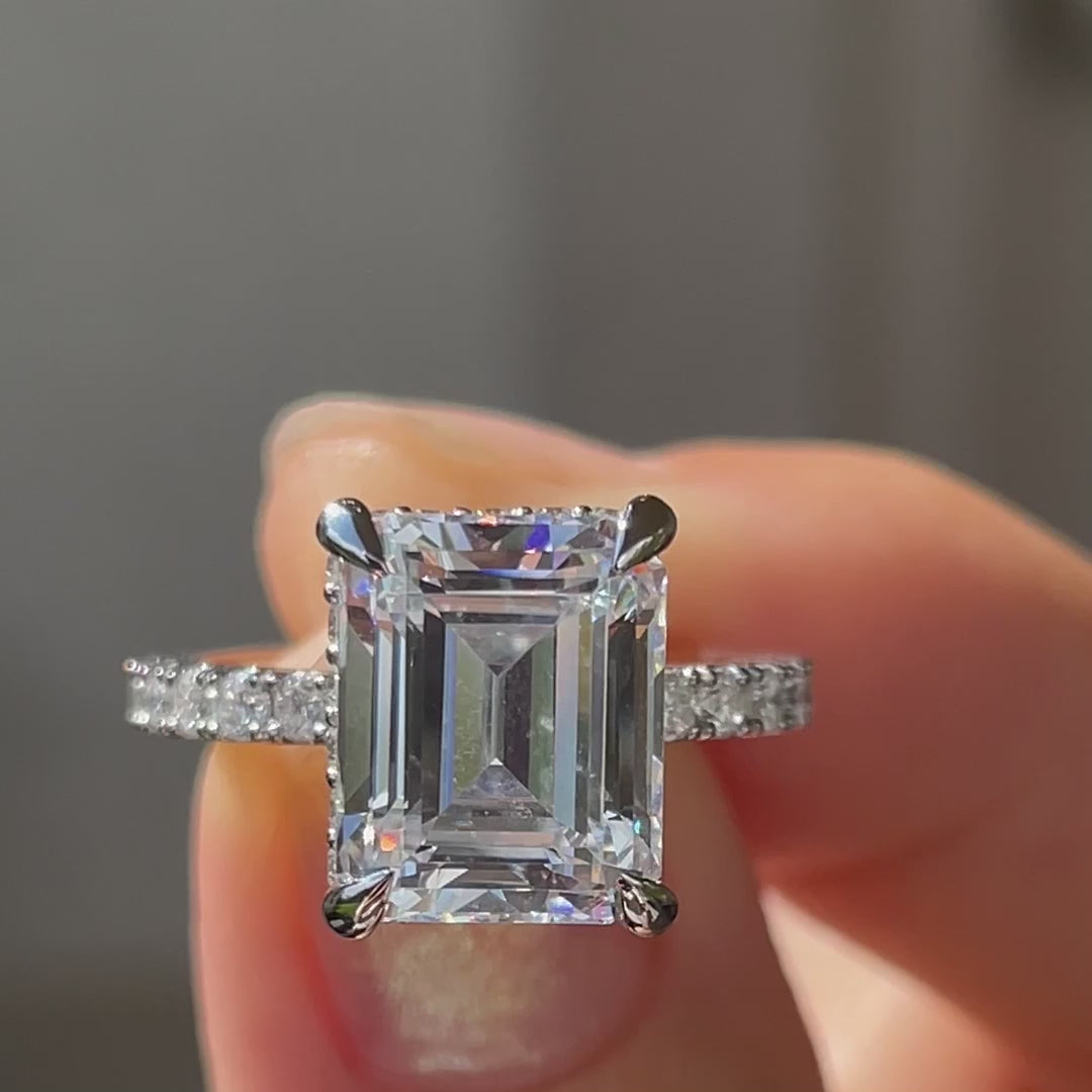 white gold accented under halo 4 claw prong 4 carat emerald lab diamond engagement ring Quorri