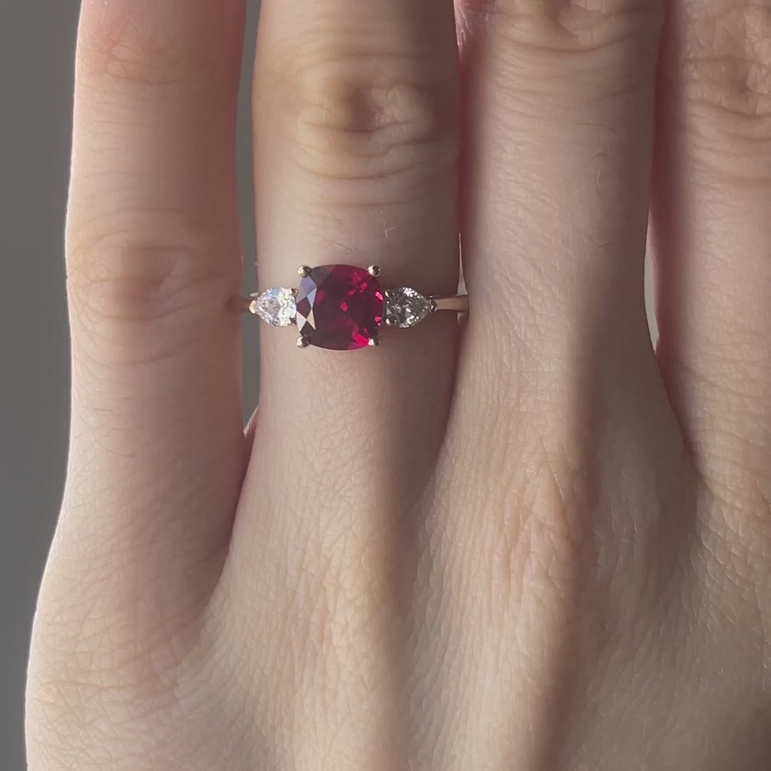 affordable Canadian designer 14k yellow gold three stone 1.50 carat lab grown blood red cushion and pear lab diamond engagement ring Quorri