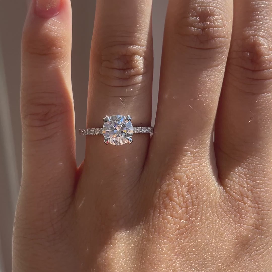 white gold accented claw prong and under-halo 2ct round lab diamond engagement ring