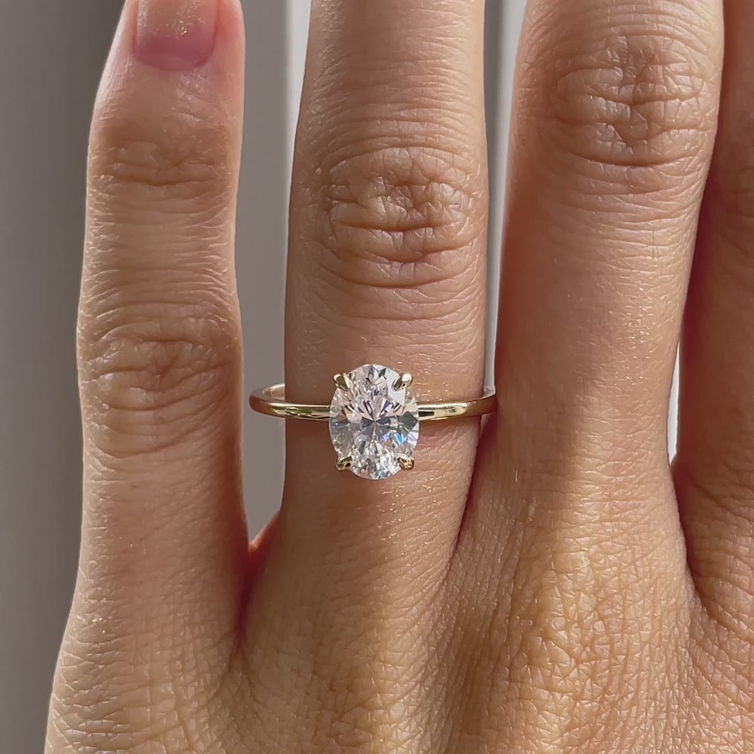 affordable claw prong yellow gold 2 carat oval lab diamond engagement ring Quorri