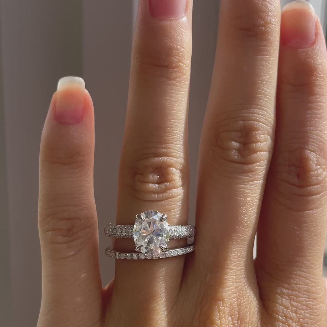 18k white gold 3 carat oval lab diamond claw prong three sided band engagement ring and wedding band set Quorri