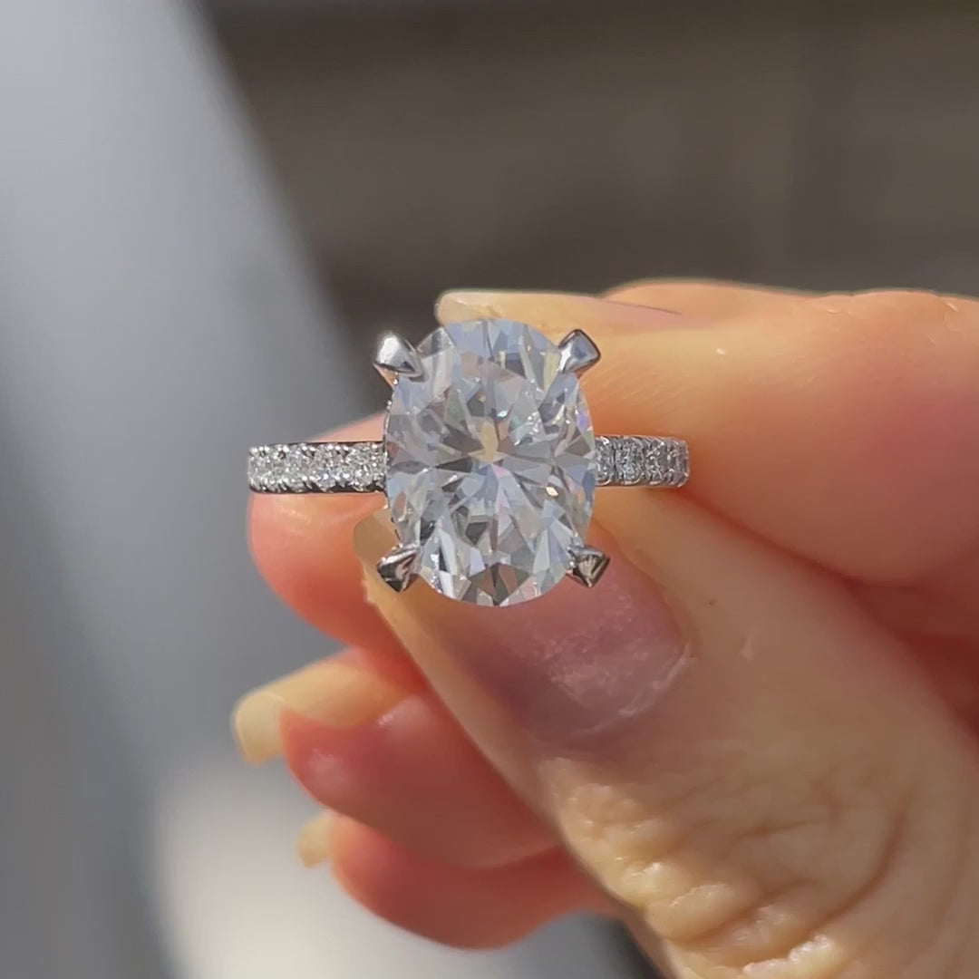 designer 4 claw prong accented 18k white gold oval lab made diamond engagement ring Quorri