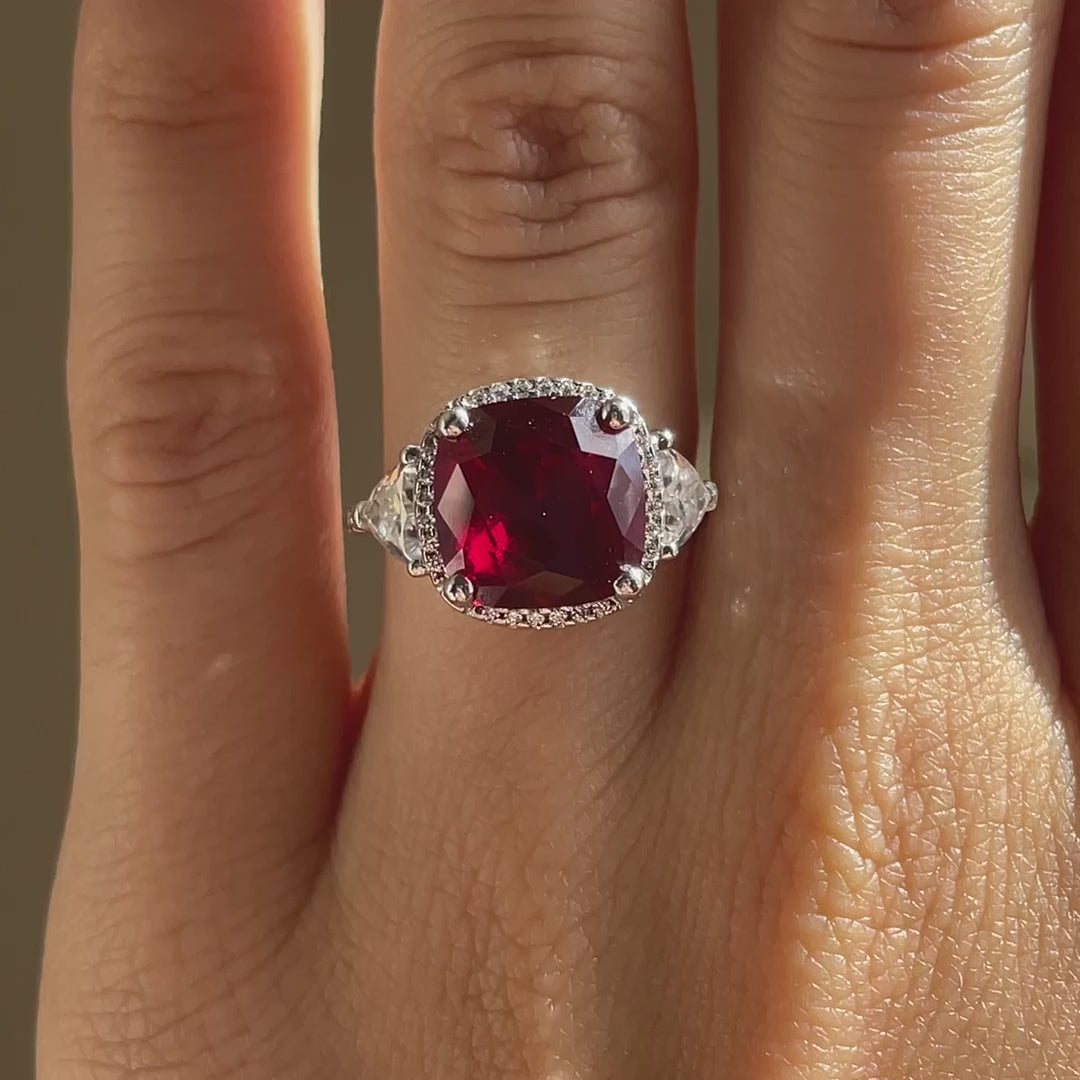 4 carat 18k white gold claw prong halo three stone cushion red ruby lab diamond engagement ring Quorri Canada