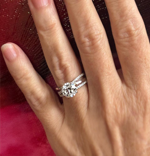 2.5 carat round lab grown diamond with three row band diamond accents in white gold at Quorri
