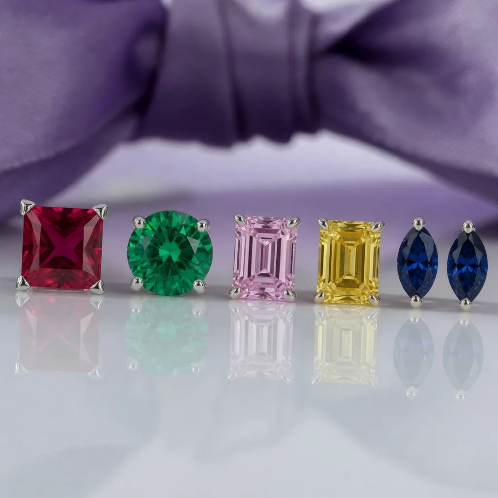 ruby princess, emerald round, sapphire pink and yellow emerald cut and blue sapphire stud earrings - Quorri