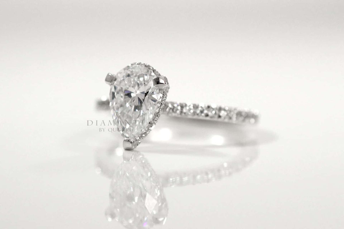 moissanite pear under halo diamond ring